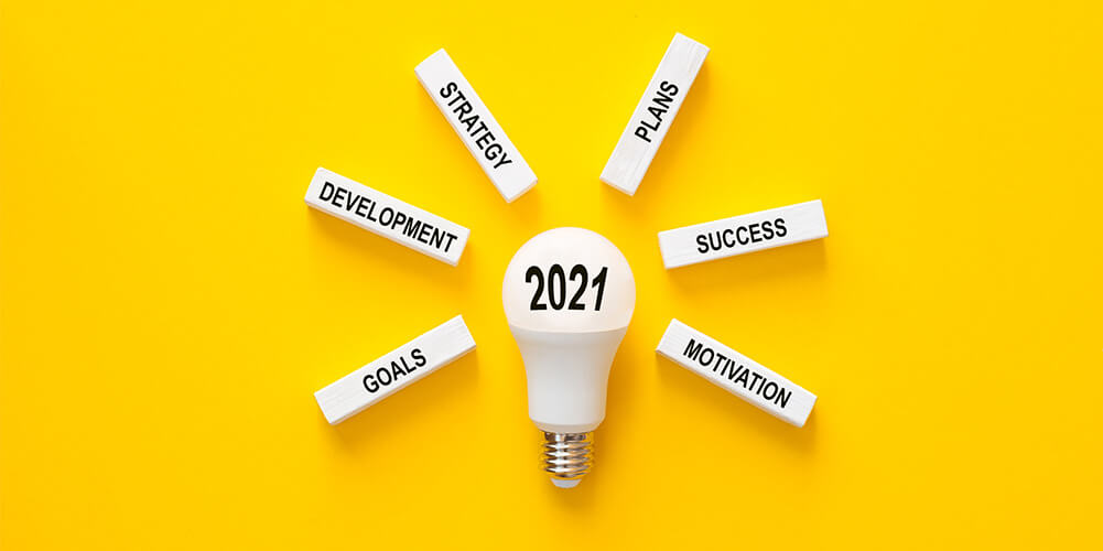 Concept art featuring a lightbulb and customer relationship terms for law firms working to implement new client-centered practices in 2021.