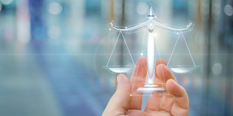Holographic Scales Of Justice Levitating On Top Of A Human Hand