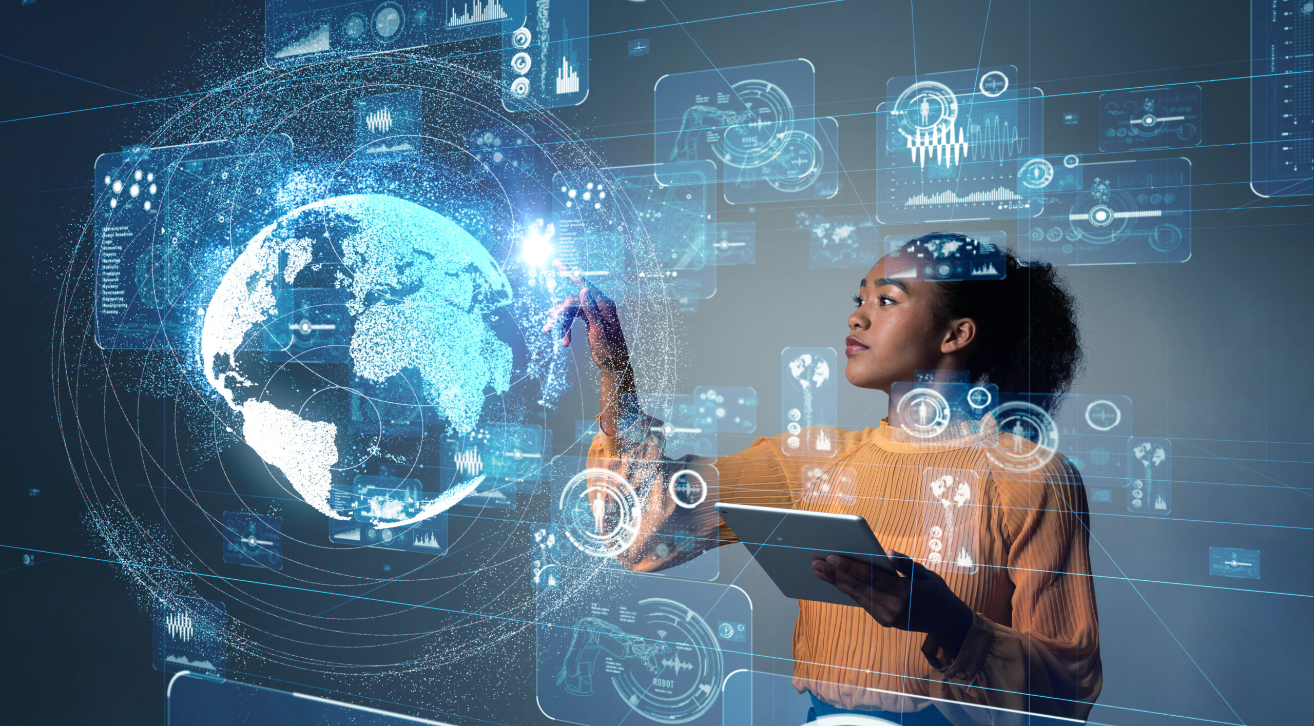 A woman interacts with a futuristic holographic interface displaying a variety of digital icons and analytics, including a prominent, glowing 3D model of Earth. She's focused on the holographic elements, which she manipulates with her hand while holding a digital tablet with the other. The scene symbolizes advanced technology, data connectivity, and the interface between humans and digital information systems.